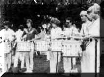 1979 snare line during pre-show warm-up, with future drum soloist: Vince Schaefer in the center of the ensemble!